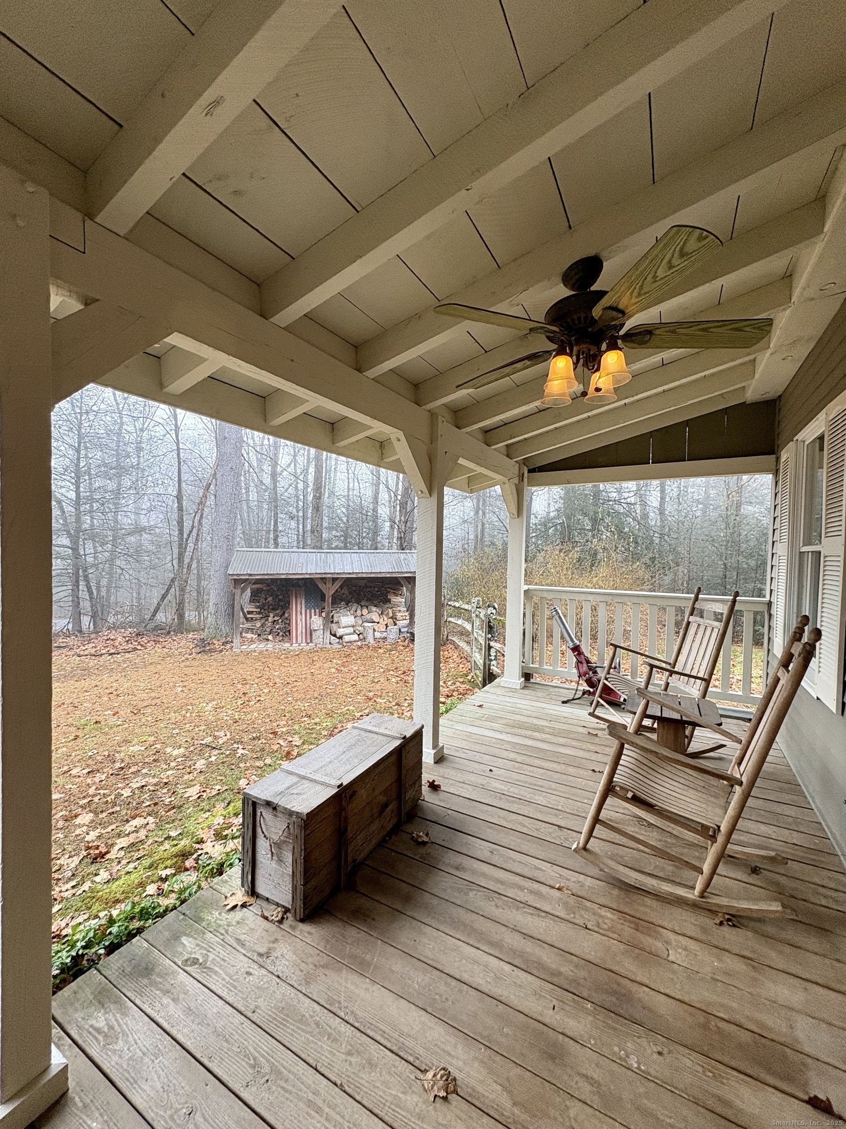 208 Old Forge Road Hartland, CT 06065 - Photo 34 of 36 a living room with a wooden floor
