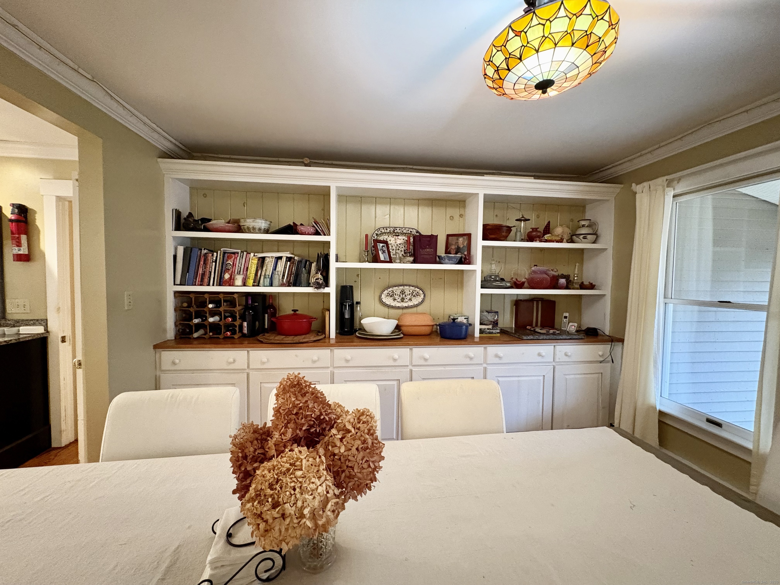 208 Old Forge Road Hartland, CT 06065 - Photo 8 of 36 a living room with furniture cabinets and window