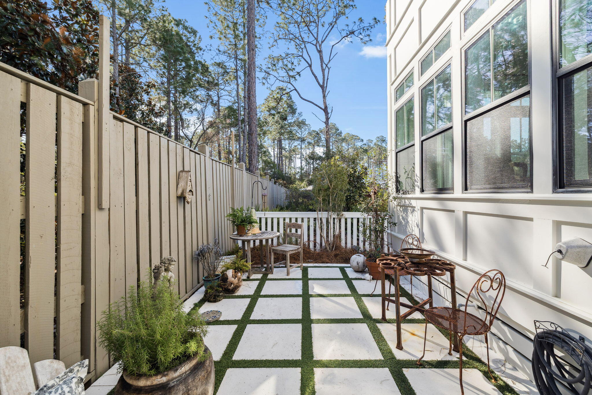 93 Eastern Lake Court Santa Rosa Beach, FL 32459 - Photo 21 of 56 a view of balcony with a potted plant and large window