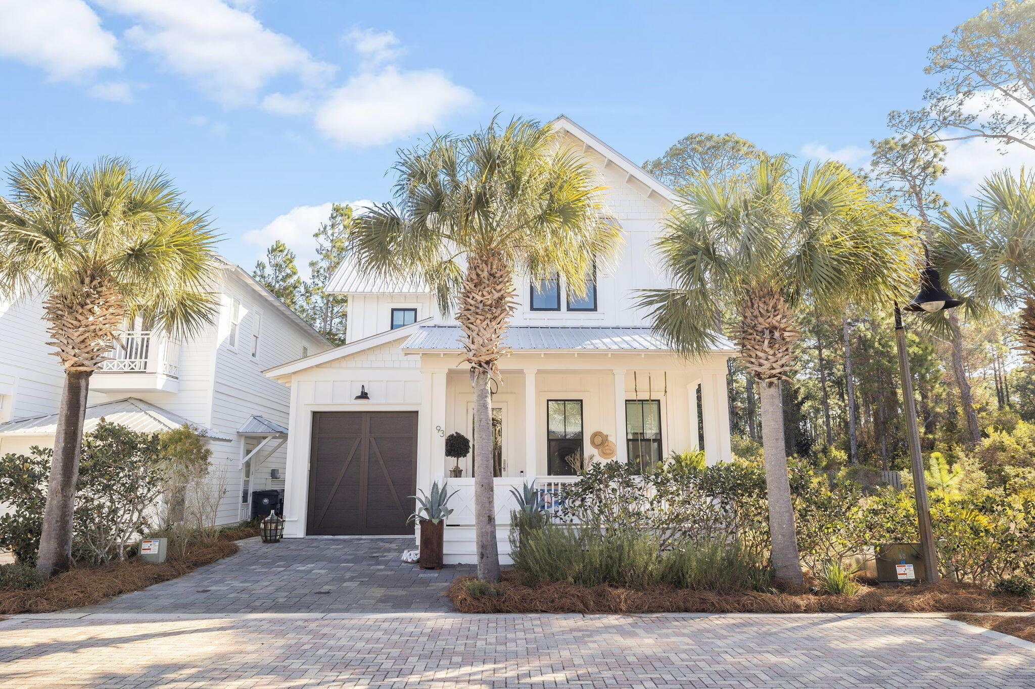 93 Eastern Lake Court Santa Rosa Beach, FL 32459 - Photo 25 of 56 a front view of a house with garden