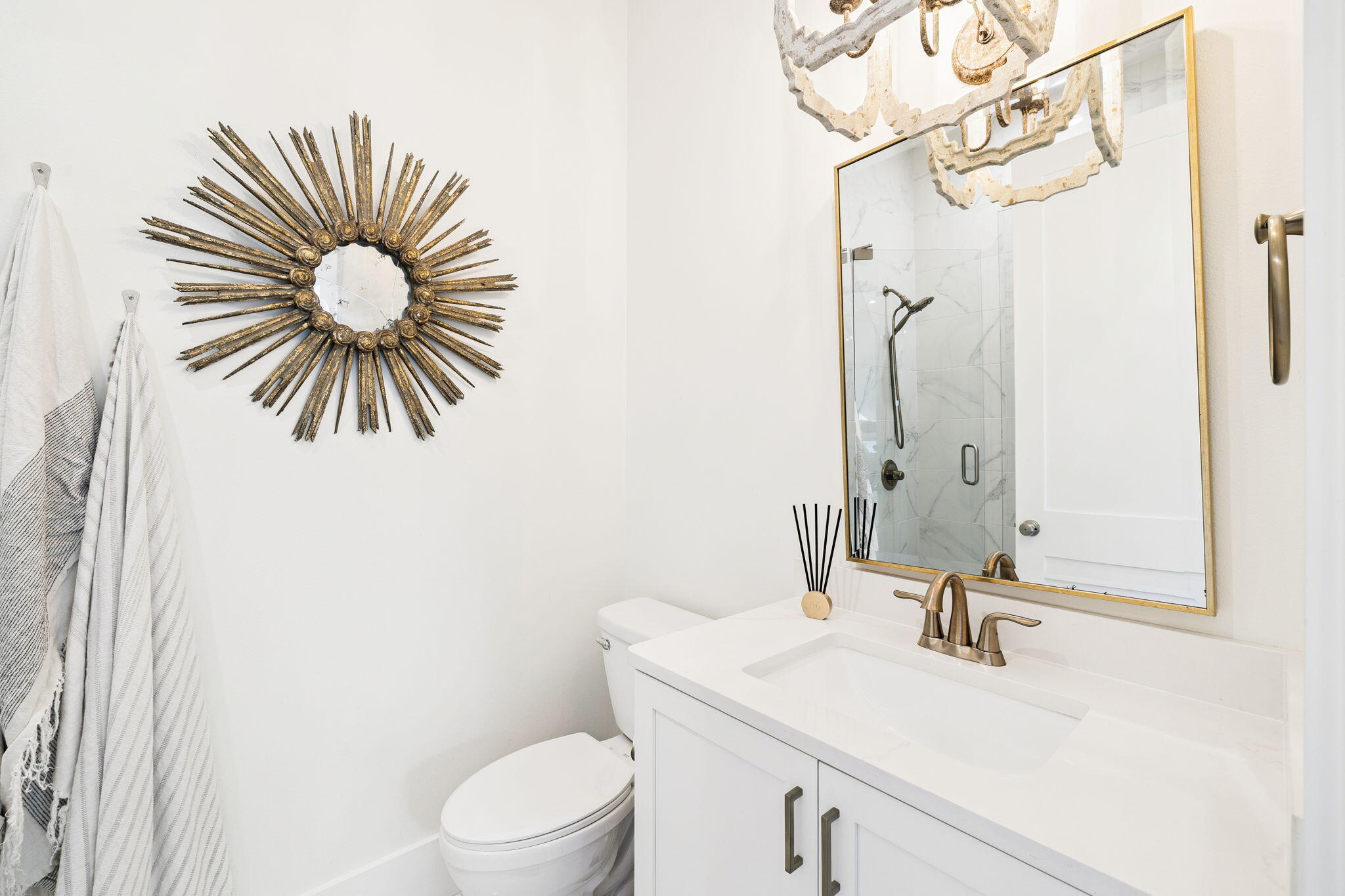 93 Eastern Lake Court Santa Rosa Beach, FL 32459 - Photo 27 of 56 a bathroom with a sink mirror vanity and toilet