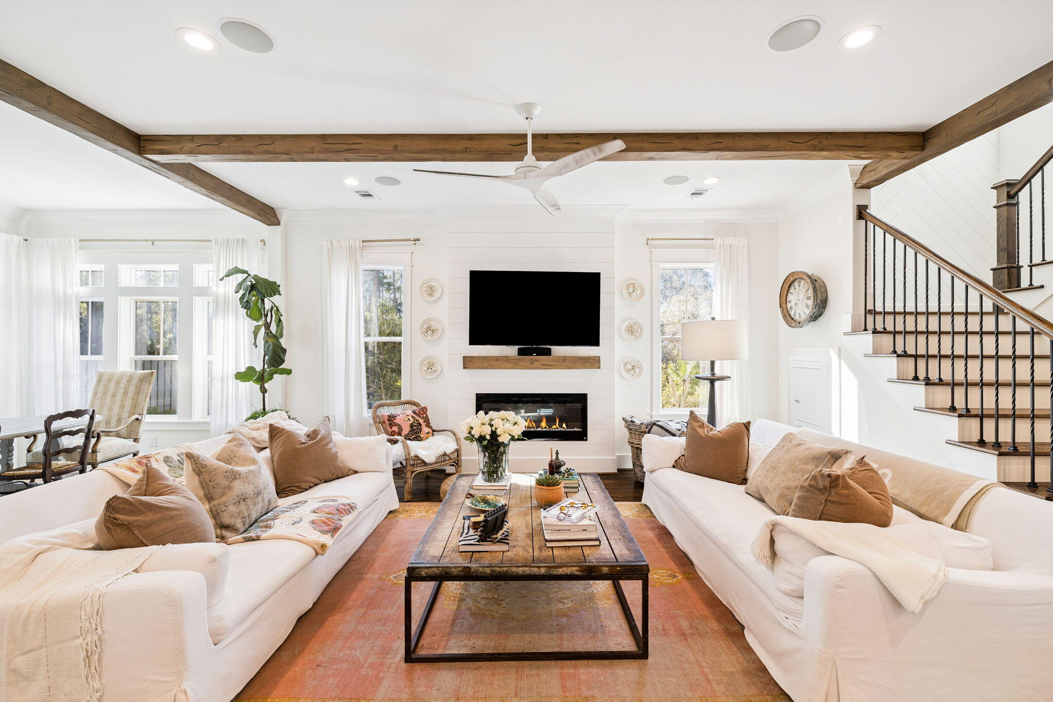93 Eastern Lake Court Santa Rosa Beach, FL 32459 - Photo 3 of 56 a living room with furniture ceiling fan and a flat screen tv