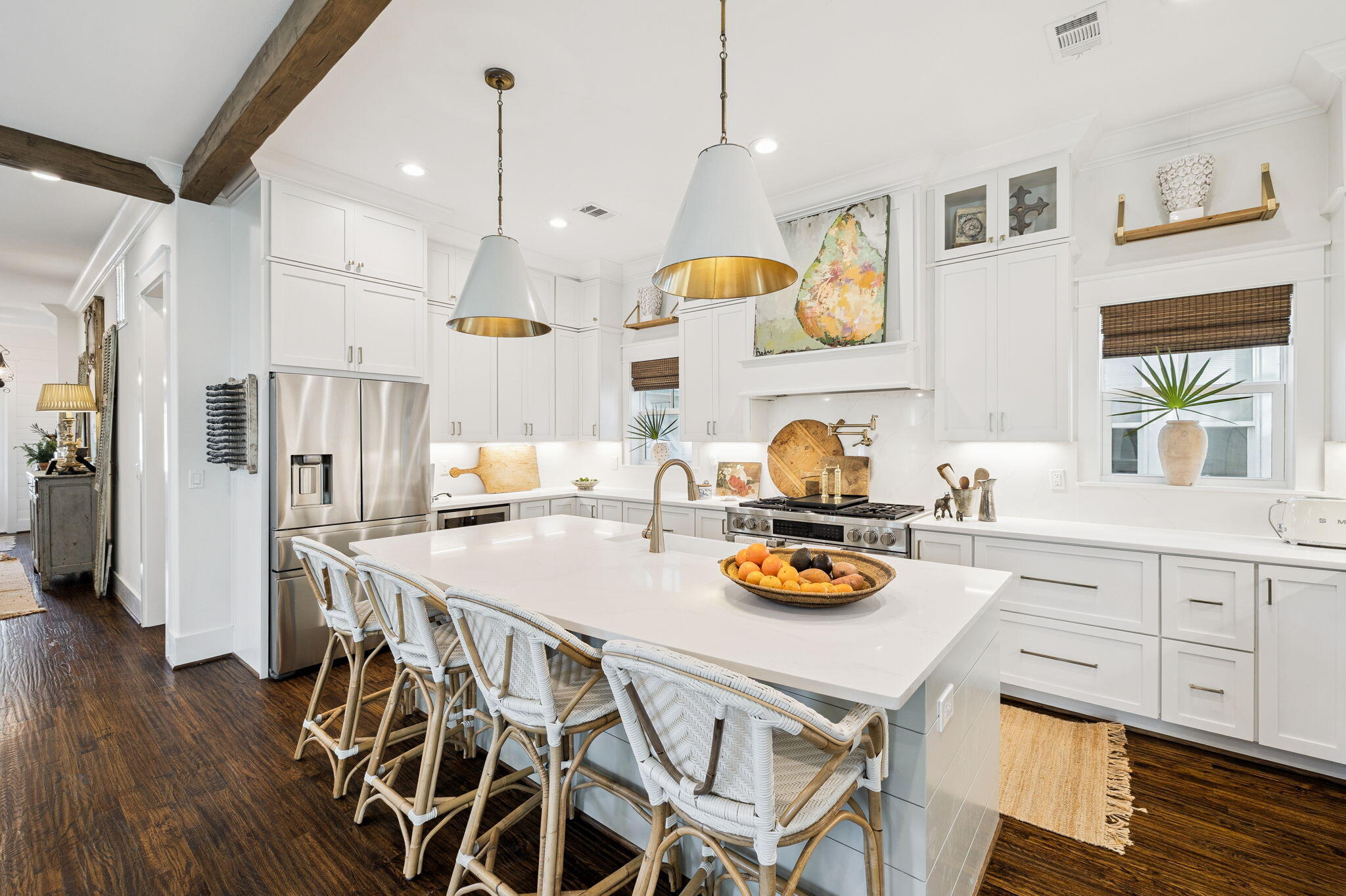 93 Eastern Lake Court Santa Rosa Beach, FL 32459 - Photo 32 of 56 a kitchen with a table chairs stove and wooden floor