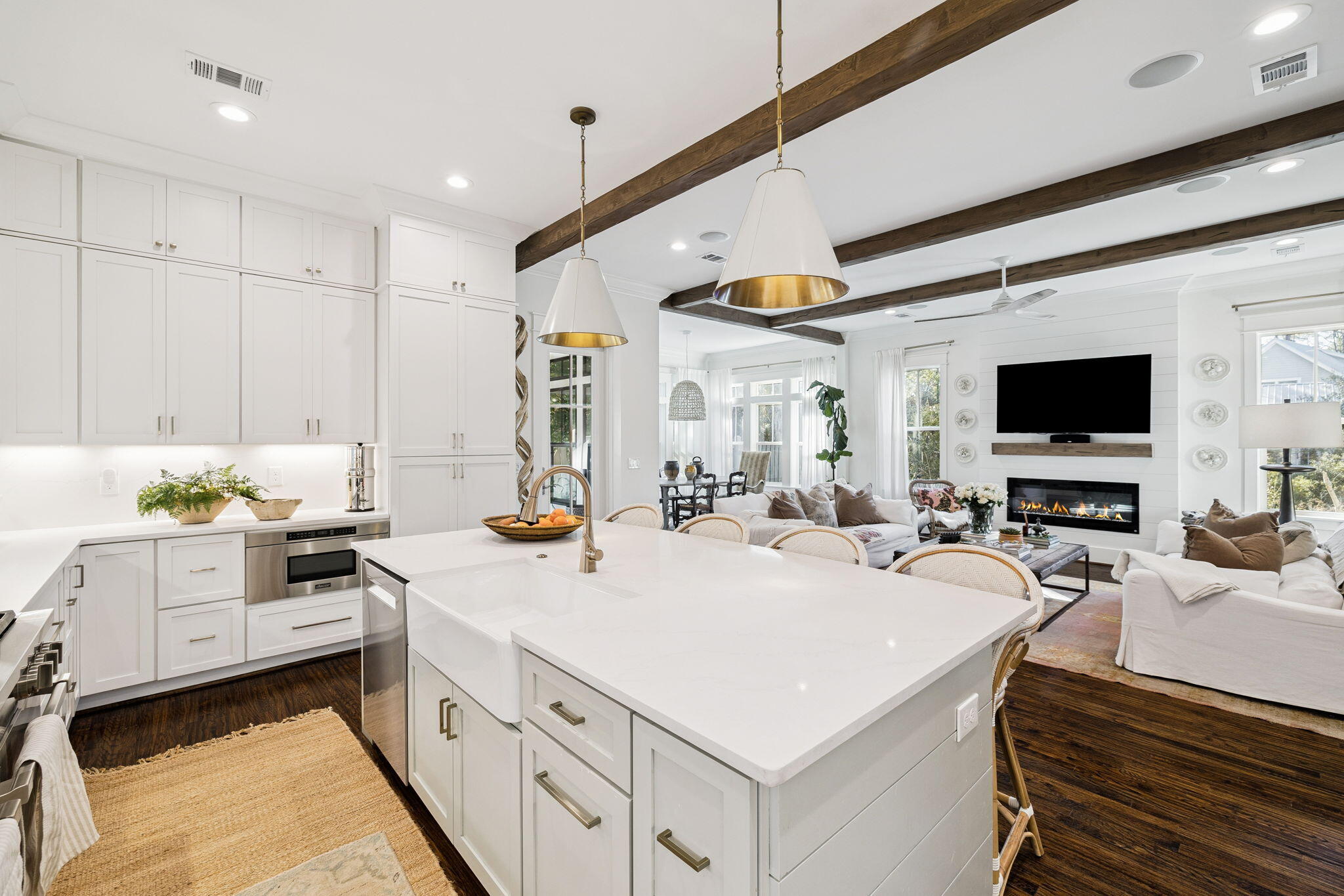 93 Eastern Lake Court Santa Rosa Beach, FL 32459 - Photo 35 of 56 a kitchen that has a lot of white cabinets and stainless steel appliances