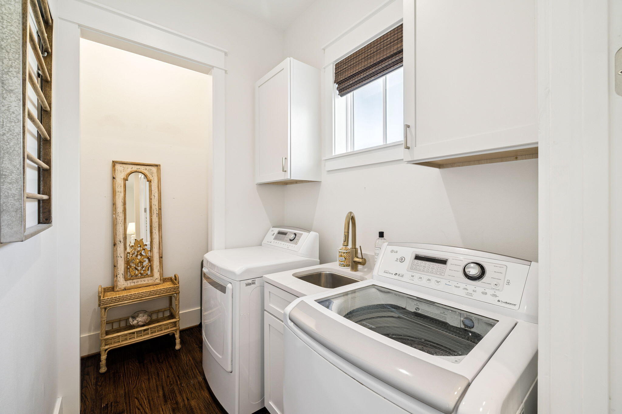 93 Eastern Lake Court Santa Rosa Beach, FL 32459 - Photo 39 of 56 a utility room with closet dryer and washer