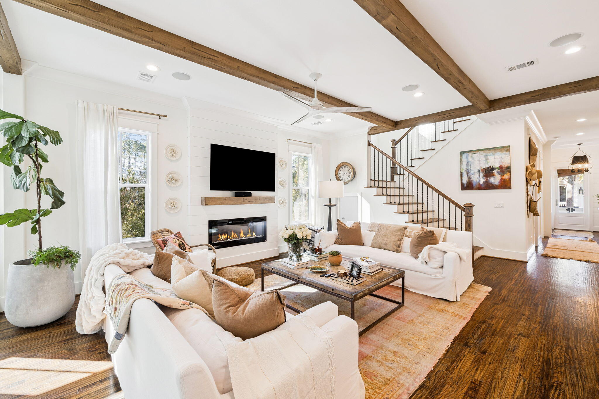 93 Eastern Lake Court Santa Rosa Beach, FL 32459 - Photo 4 of 56 a living room with furniture and a flat screen tv