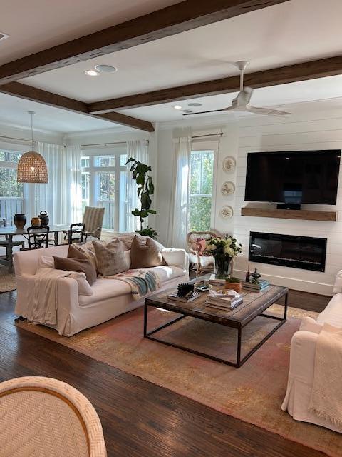 93 Eastern Lake Court Santa Rosa Beach, FL 32459 - Photo 5 of 56 a living room with fireplace furniture and a flat screen tv