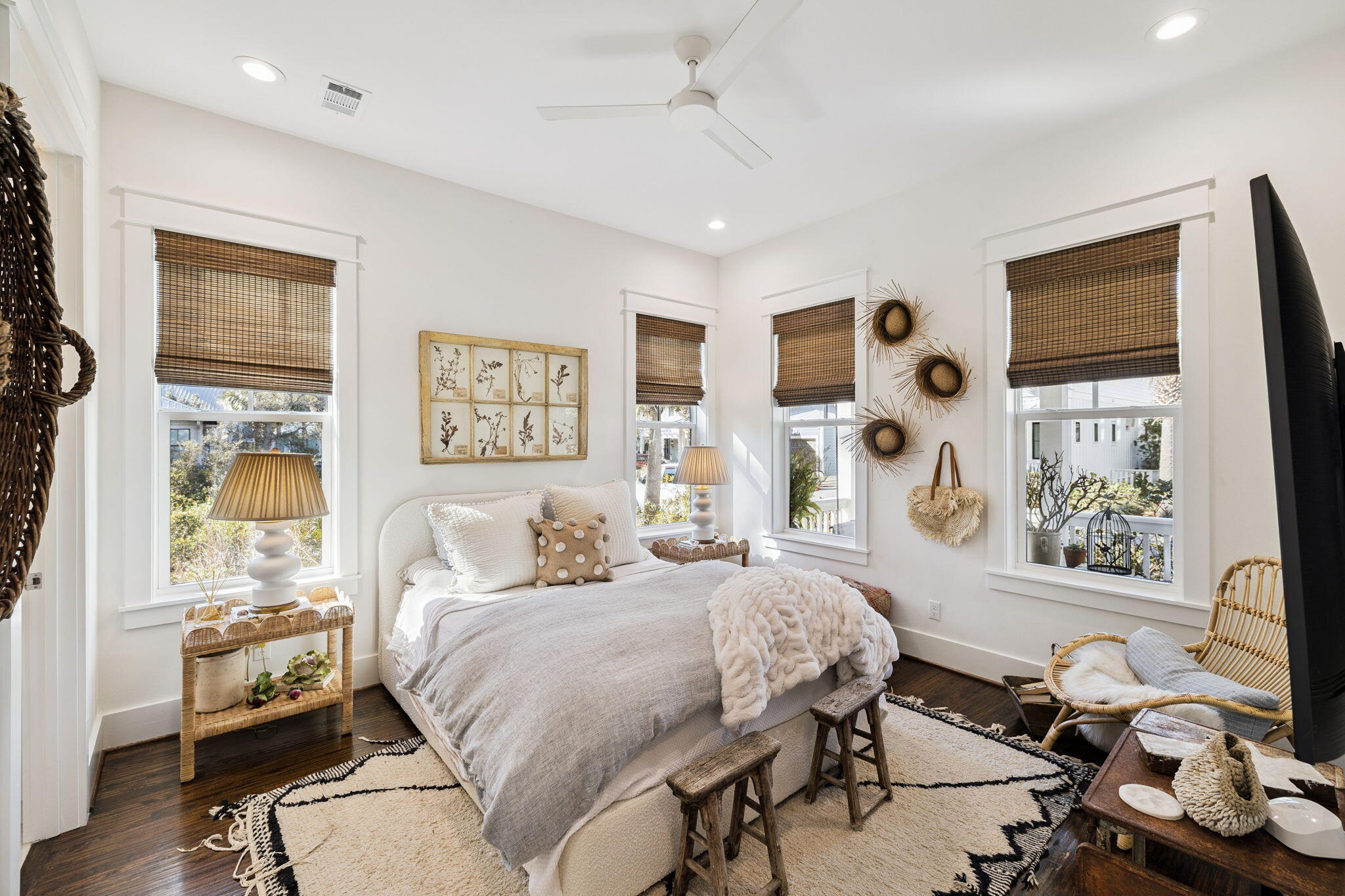 93 Eastern Lake Court Santa Rosa Beach, FL 32459 - Photo 6 of 56 a bedroom with a bed and wooden floor