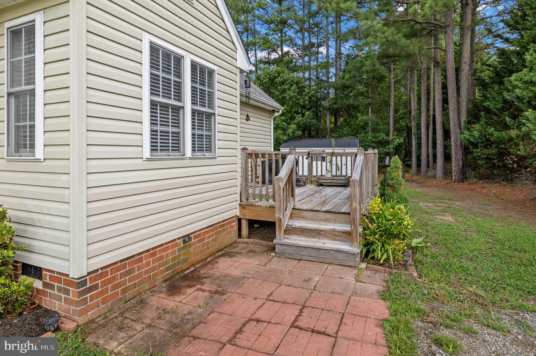 151 Deep Landing Road Tappahannock, VA 22560 - Photo 23 of 31 Stairs leading down to the side of the home