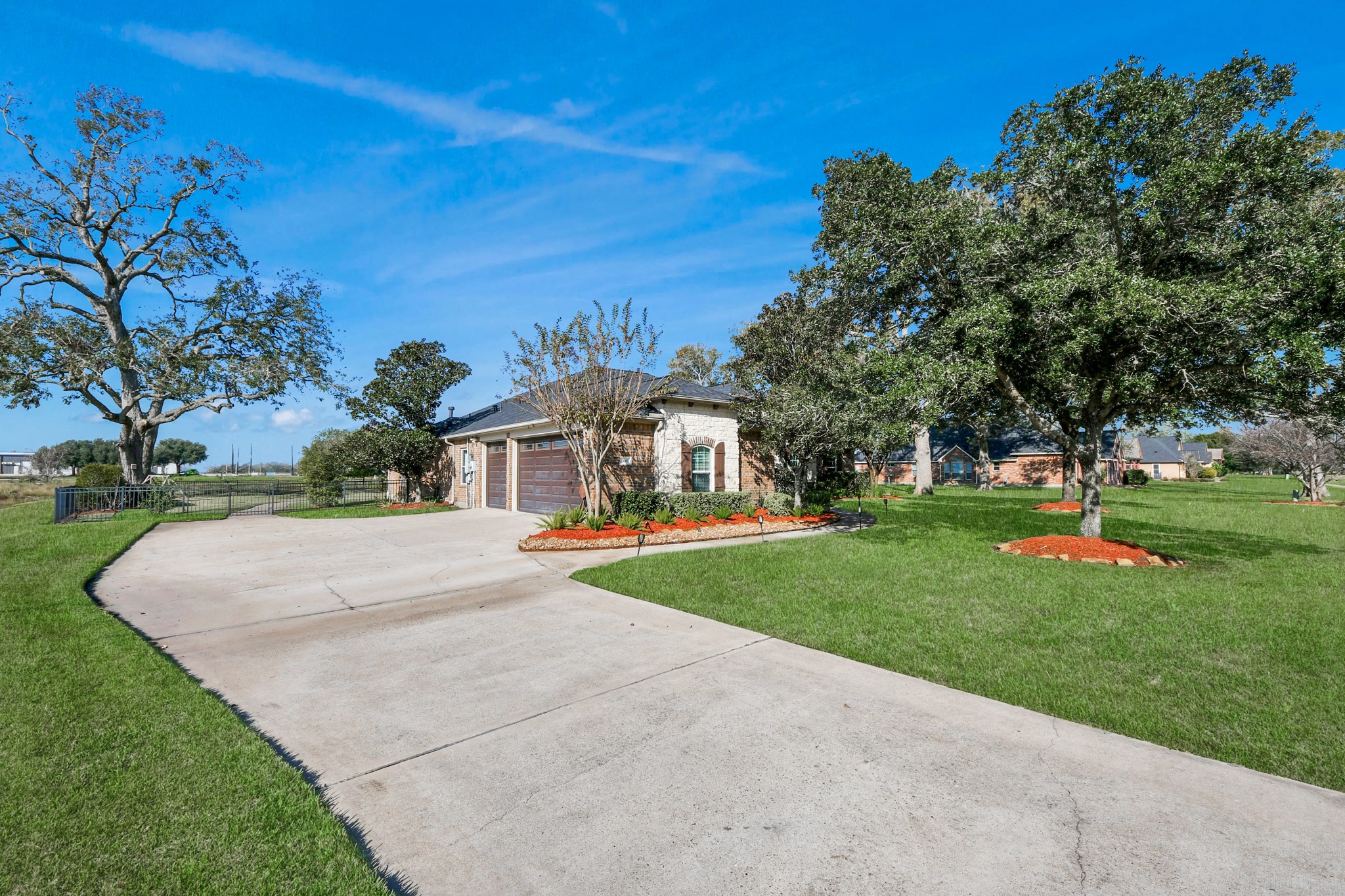 3511 River Bend Drive Rosenberg, TX 77471 - Photo 41 of 50 Driveway stretching elegantly to the three car garage.