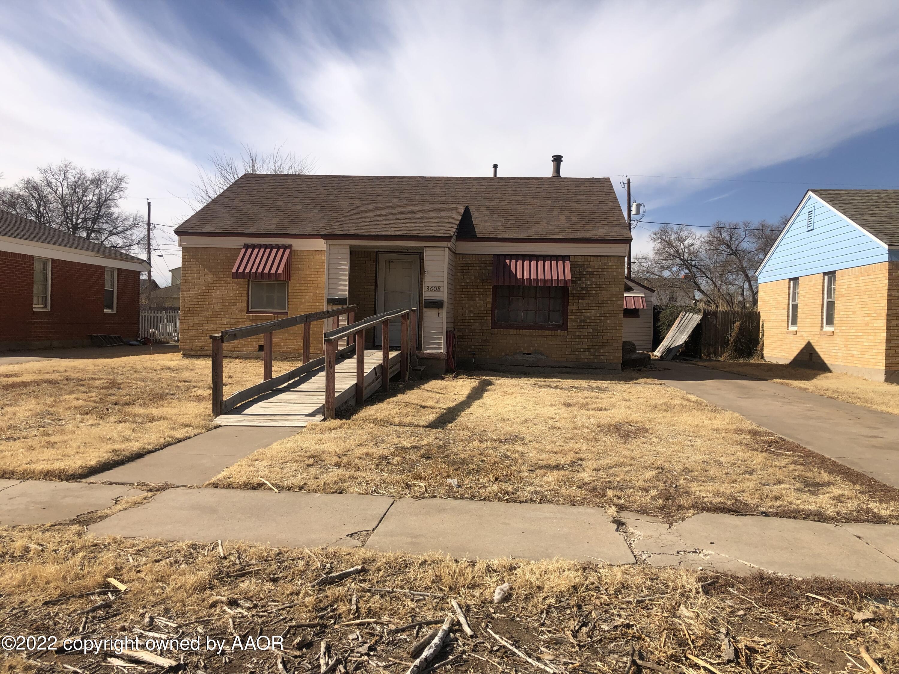 3608 South Hughes Street Amarillo, TX 79110 - Photo 1 of 3 a view of a house with a yard