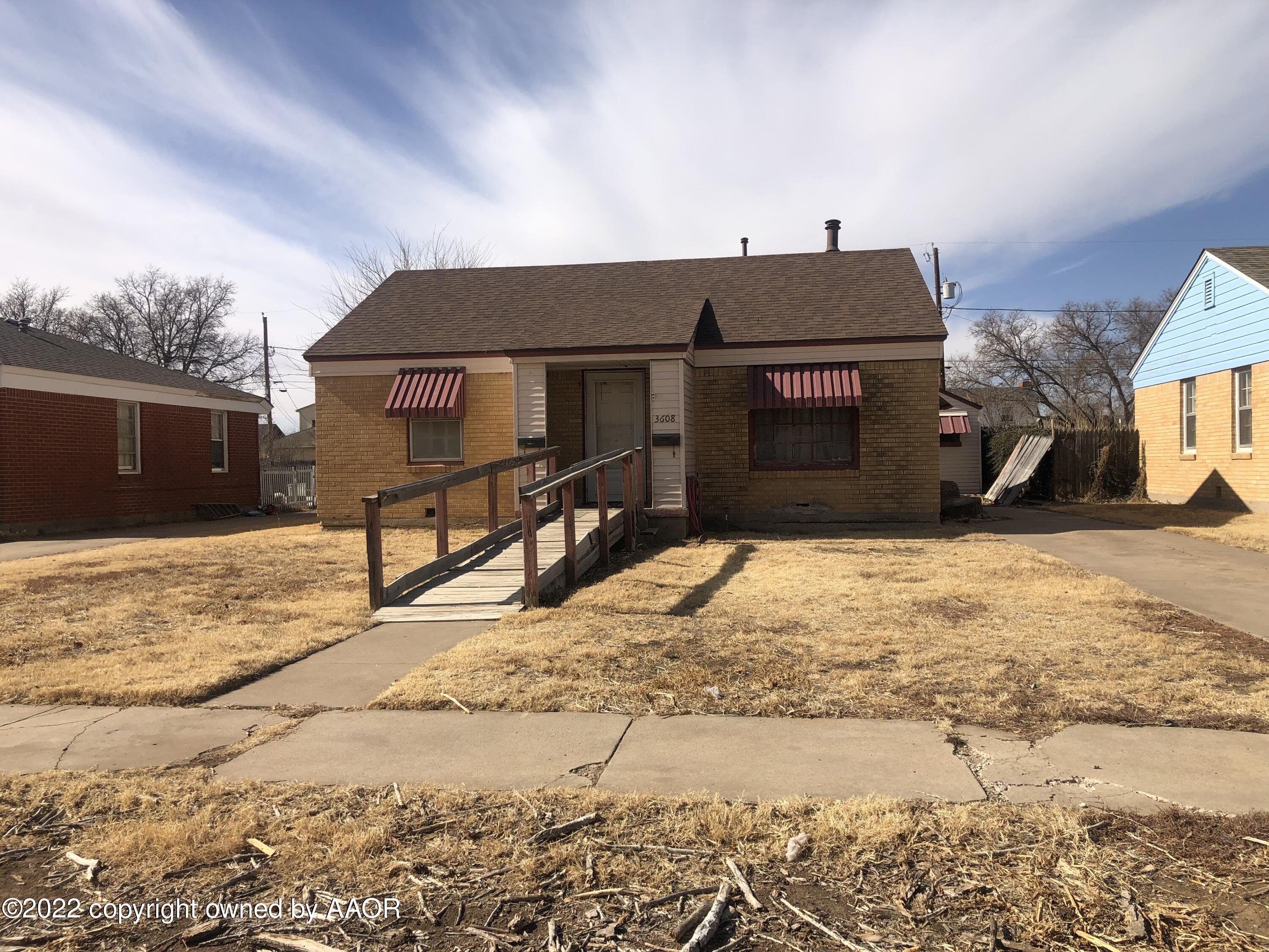 3608 South Hughes Street Amarillo, TX 79110 - Photo 2 of 3 a view of a house with a yard