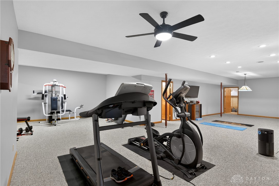 5264 Frazier-Guy Road Sidney, OH 45365 - Photo 34 of 51 This dedicated exercise room offers comfort and ample space for your fitness routine.