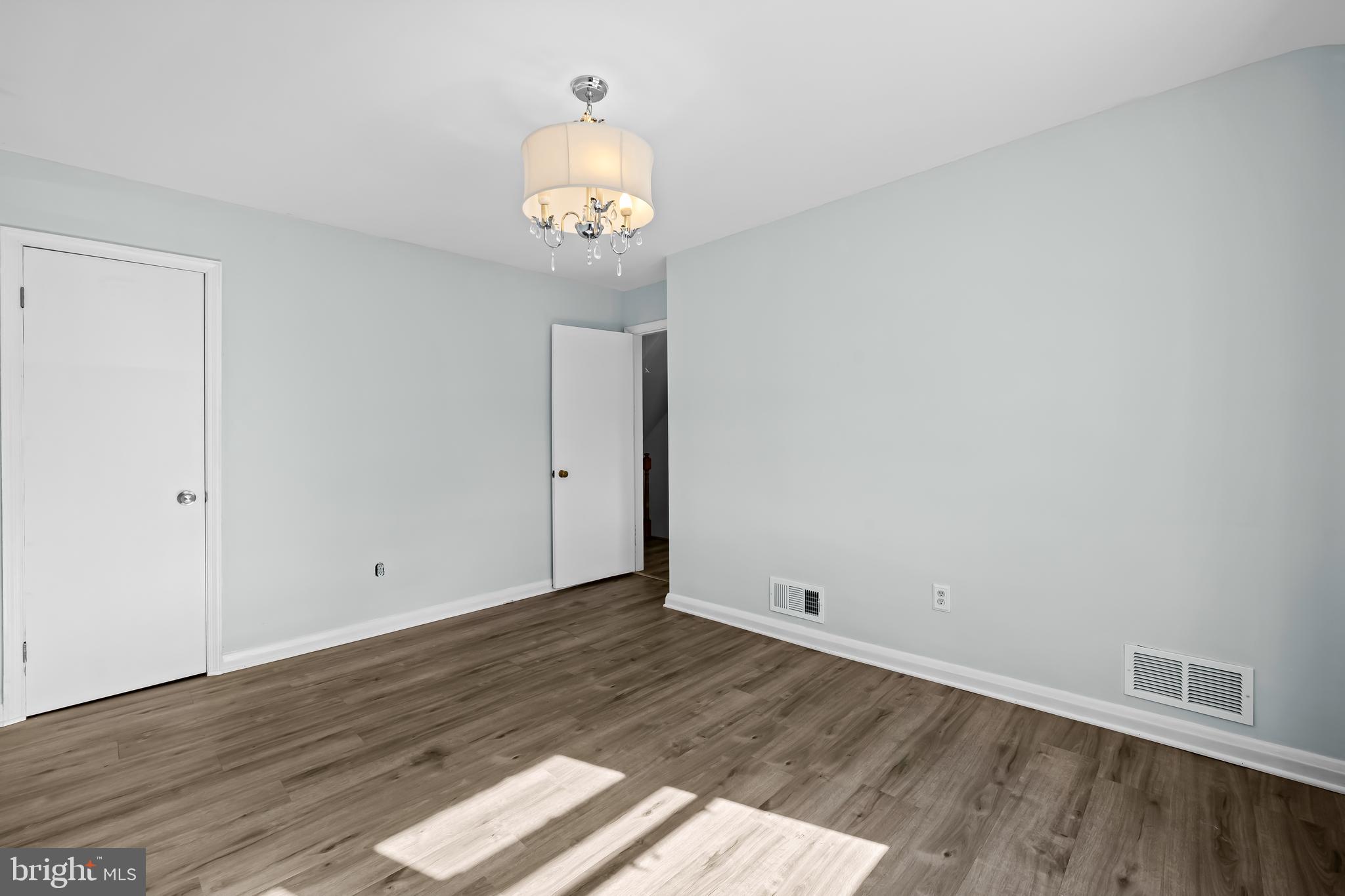 1027 Evesham Avenue Baltimore, MD 21212 - Photo 28 of 39 a view of room with wooden floor