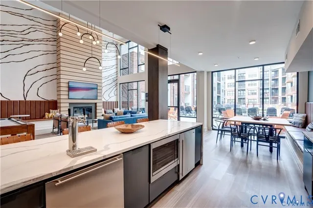 a living room with furniture gym equipment and a view of living room