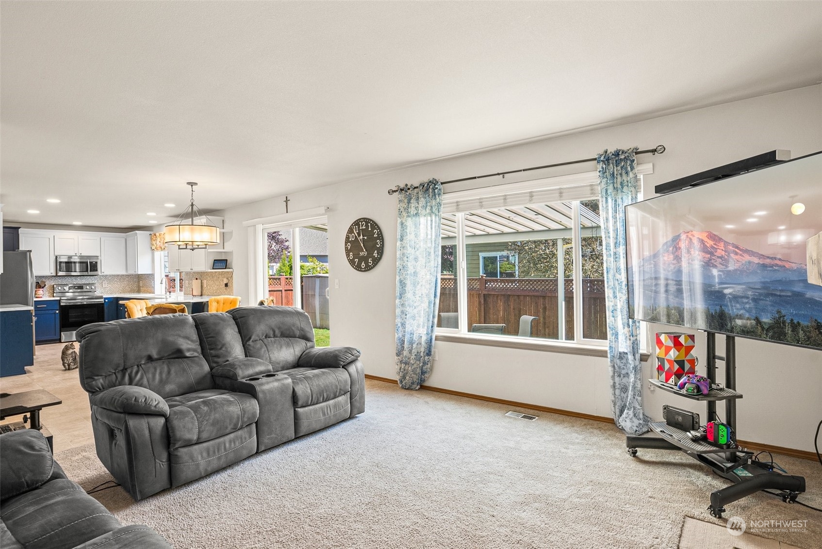 6642 Compass Street Southeast Lacey, WA 98513 - Photo 19 of 40 a living room with furniture and a window