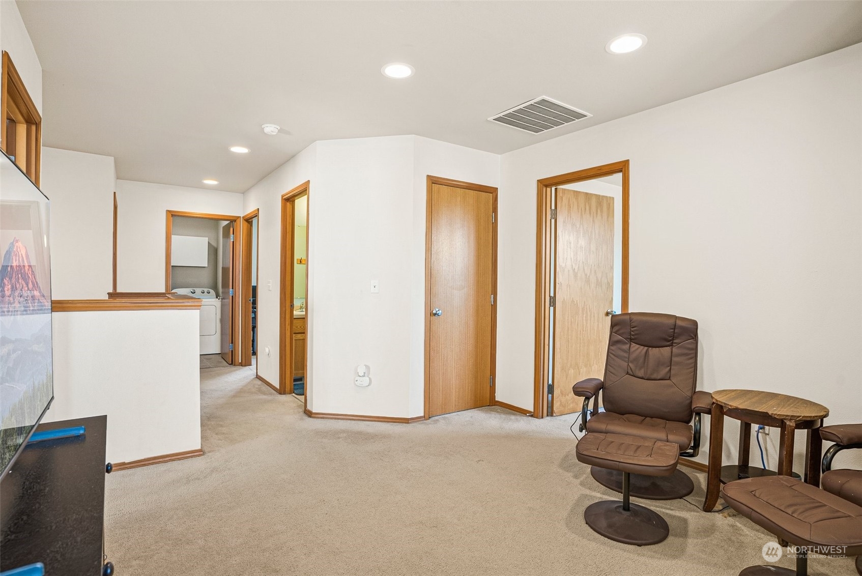 6642 Compass Street Southeast Lacey, WA 98513 - Photo 23 of 40 a living room with furniture and a walk in closet