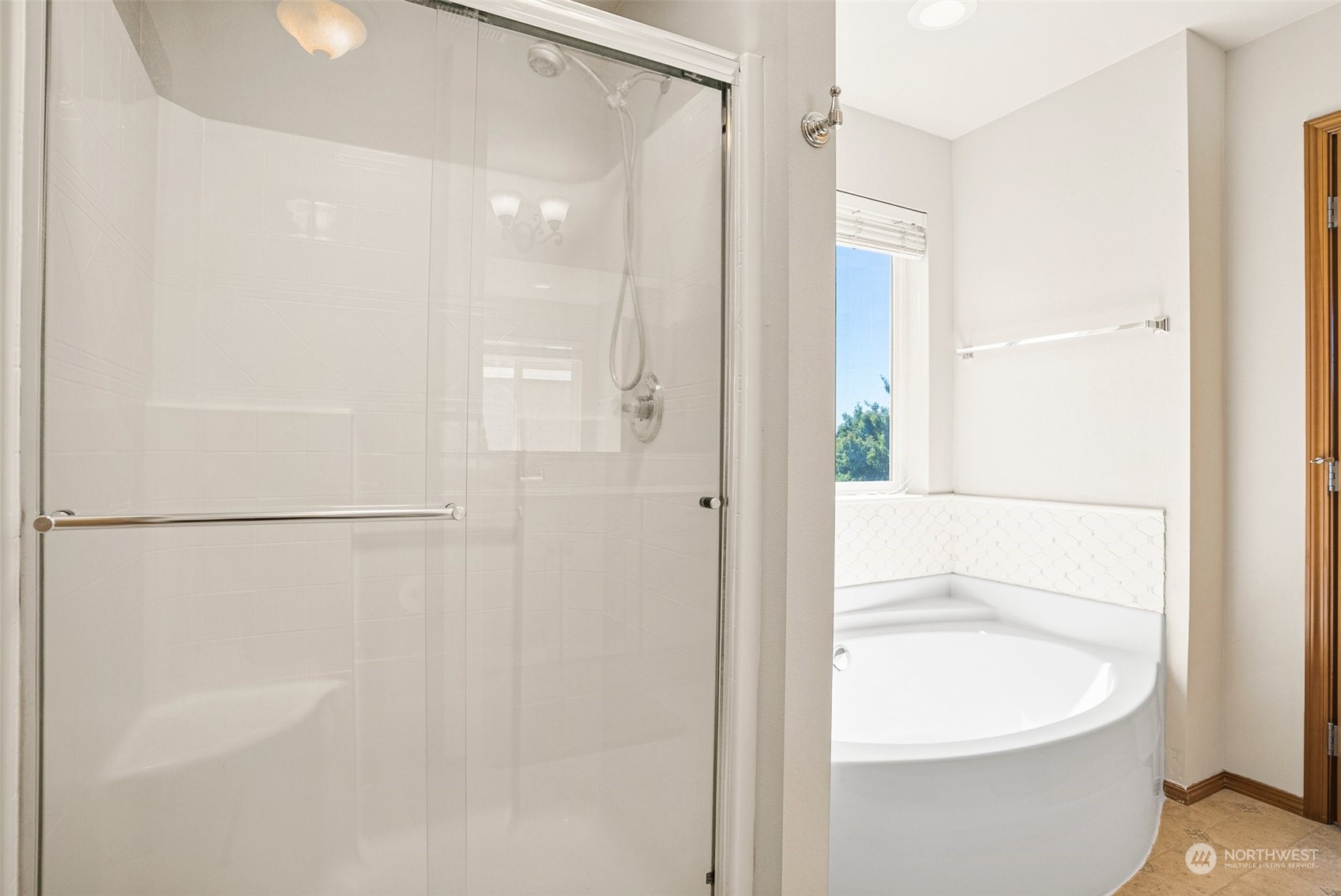 6642 Compass Street Southeast Lacey, WA 98513 - Photo 26 of 40 a bathroom with a bathtub a shower a toilet and a sink