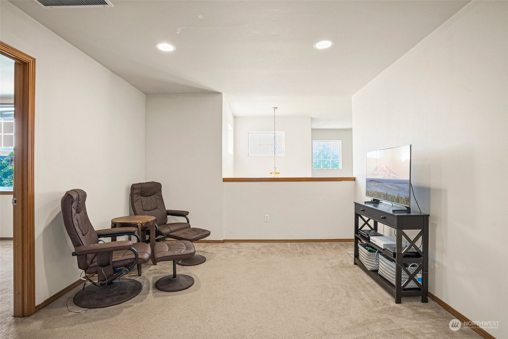 6642 Compass Street Southeast Lacey, WA 98513 - Photo 28 of 40 a room with furniture