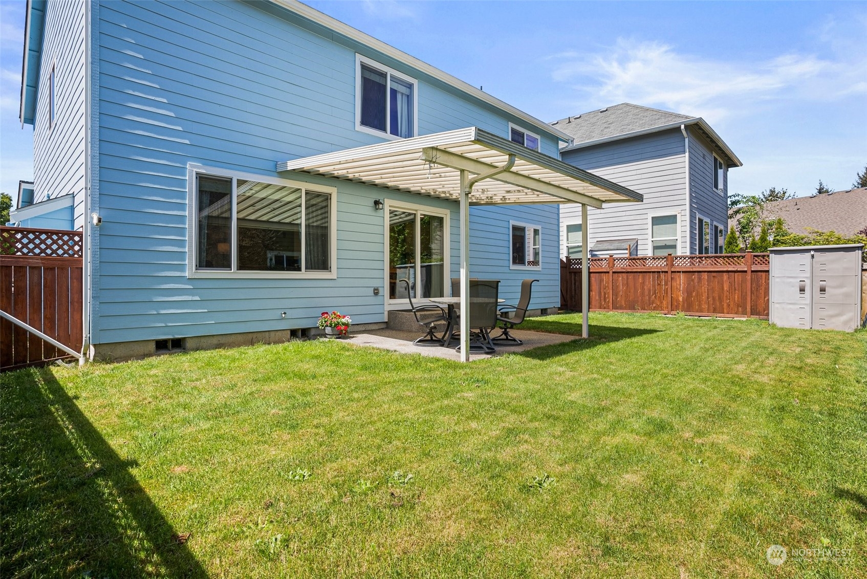 6642 Compass Street Southeast Lacey, WA 98513 - Photo 36 of 40 a view of a house with backyard and porch