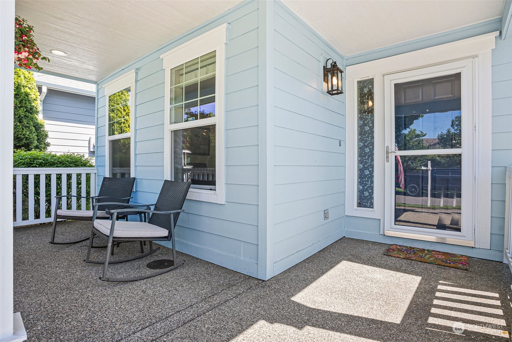 6642 Compass Street Southeast Lacey, WA 98513 - Photo 4 of 40 a view of a chair and table in the back yard of the house
