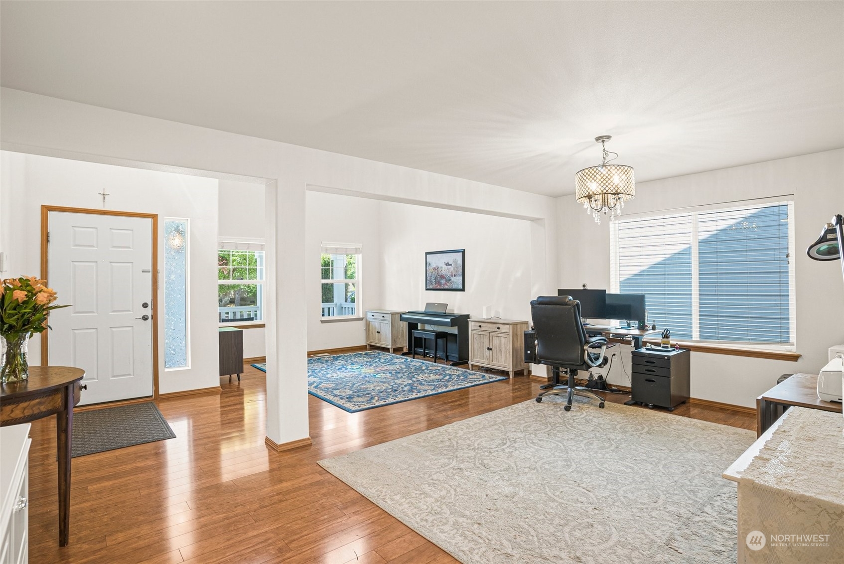 6642 Compass Street Southeast Lacey, WA 98513 - Photo 9 of 40 a view of a livingroom with workspace and a window