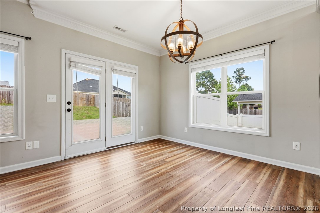 33 Colonist Place Cameron, NC 28326 - Photo 22 of 47 a view of an empty room with wooden floor and a window
