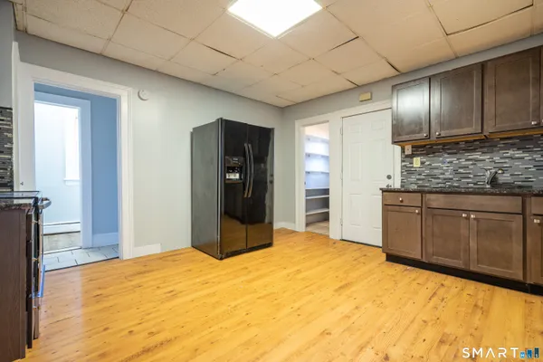 a bedroom with a bed and cabinets