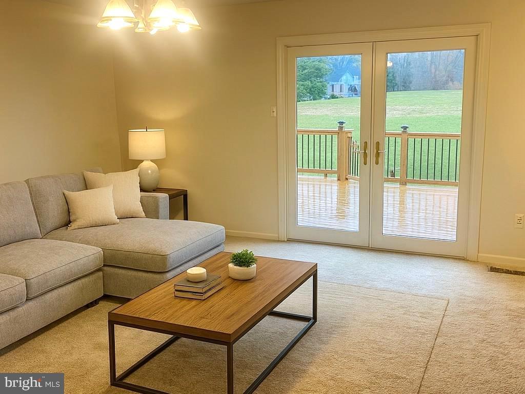 86 Louis James Court, Unit 86 Upper Chichester, PA 19014 - Photo 2 of 12 a living room with a couch and next to a window