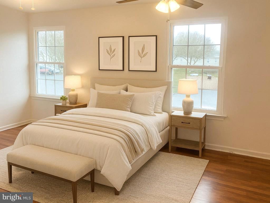 86 Louis James Court, Unit 86 Upper Chichester, PA 19014 - Photo 6 of 12 a bedroom with a bed and a window