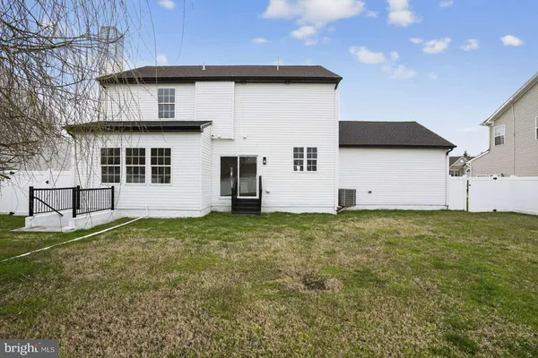 a house view with a backyard space