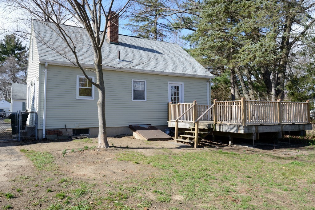 155 Carroll Street Springfield, MA 01108 - Photo 12 of 15 a view of a house with backyard and trees