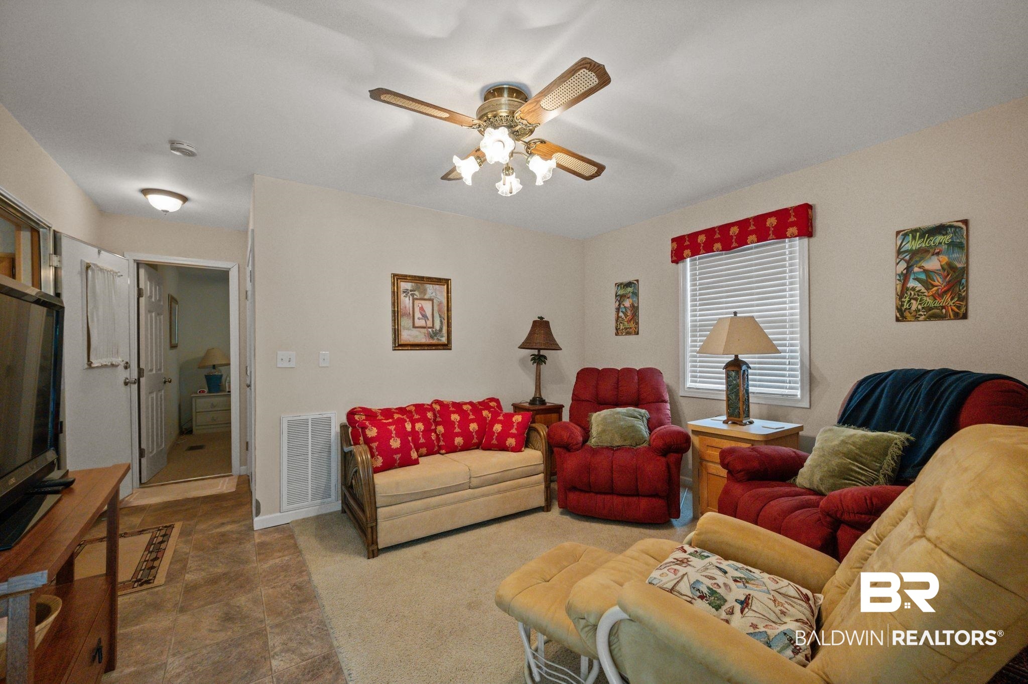 24711 County Road 20, Unit A11 Elberta, AL 36530 - Photo 8 of 35 Living room featuring a ceiling fan