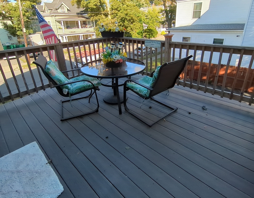 7 Cherry Street Lynn, MA 01902 - Photo 13 of 42 a view of a chairs on the roof deck