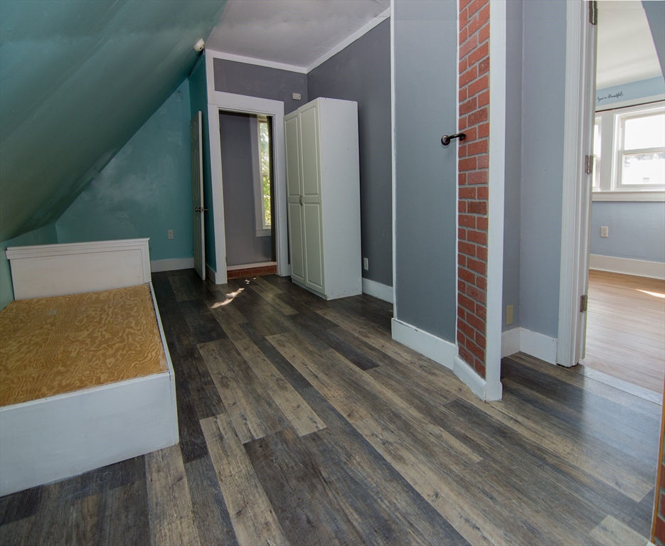 7 Cherry Street Lynn, MA 01902 - Photo 28 of 42 a view of an empty room and wooden floor