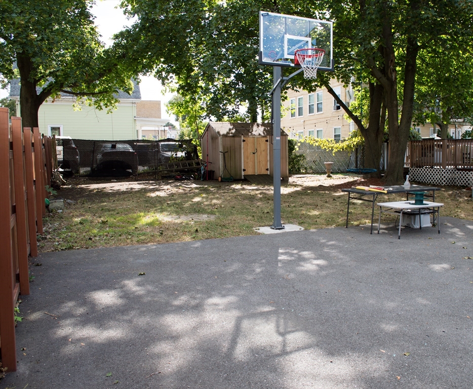 7 Cherry Street Lynn, MA 01902 - Photo 36 of 42 a view of a patio with a tree
