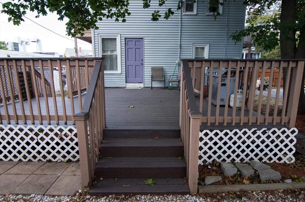 7 Cherry Street Lynn, MA 01902 - Photo 37 of 42 a view of a wrought iron gate