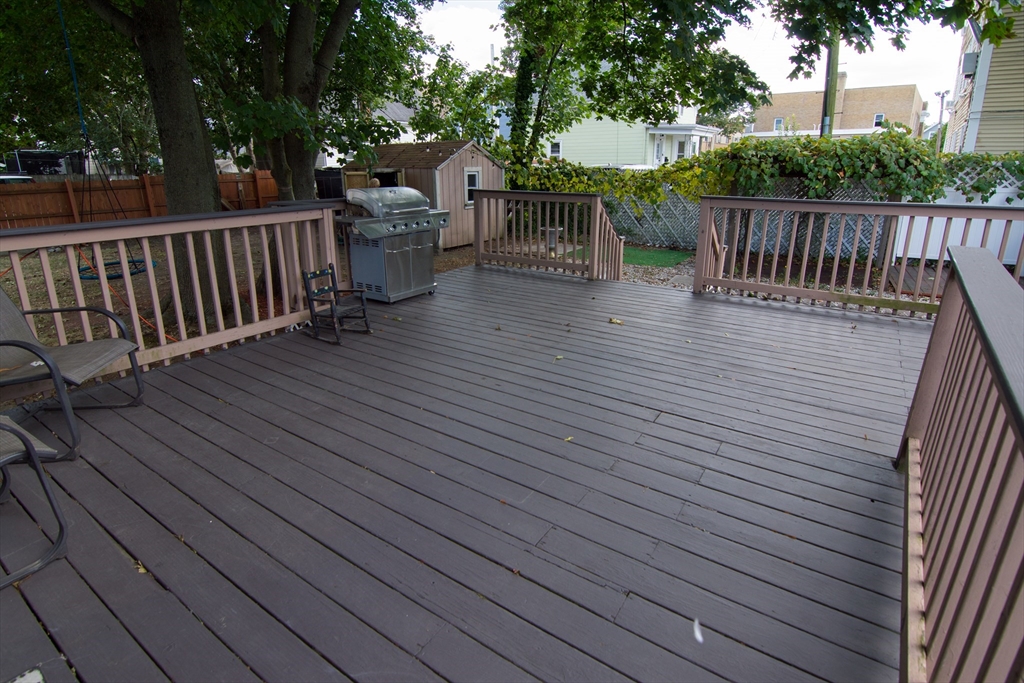 7 Cherry Street Lynn, MA 01902 - Photo 39 of 42 a view of deck with wooden floor and outdoor seating