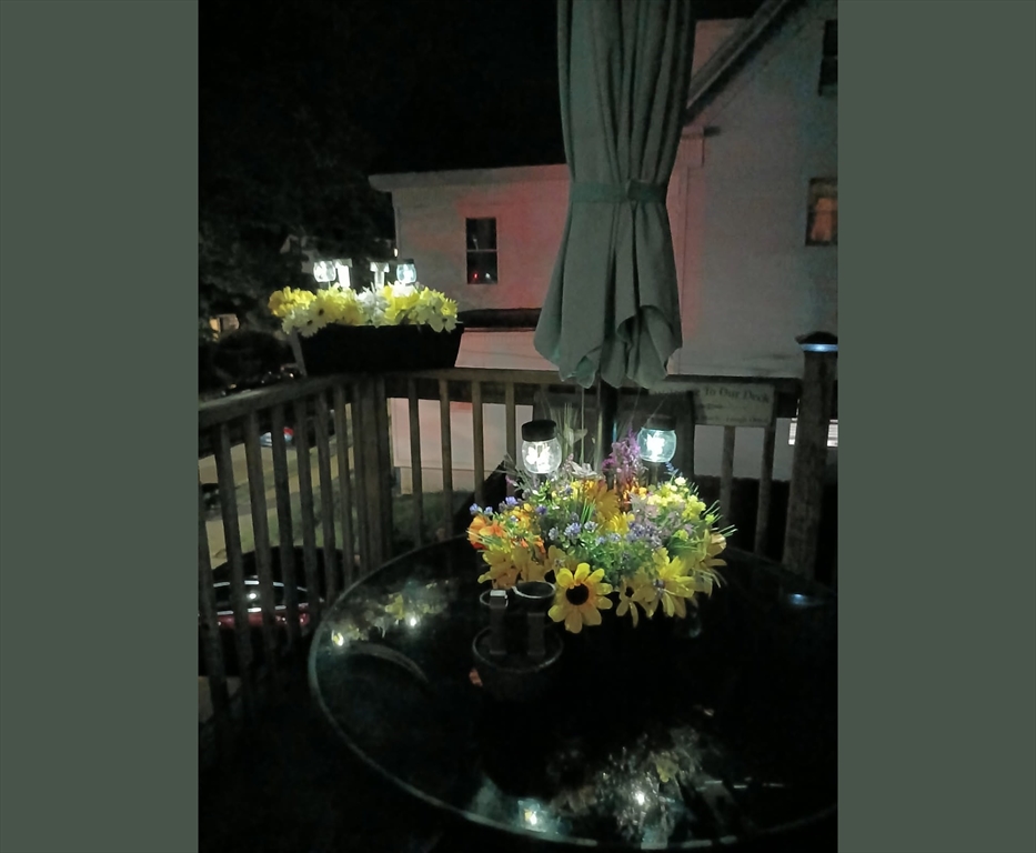 7 Cherry Street Lynn, MA 01902 - Photo 42 of 42 a vase of flowers sitting on a table