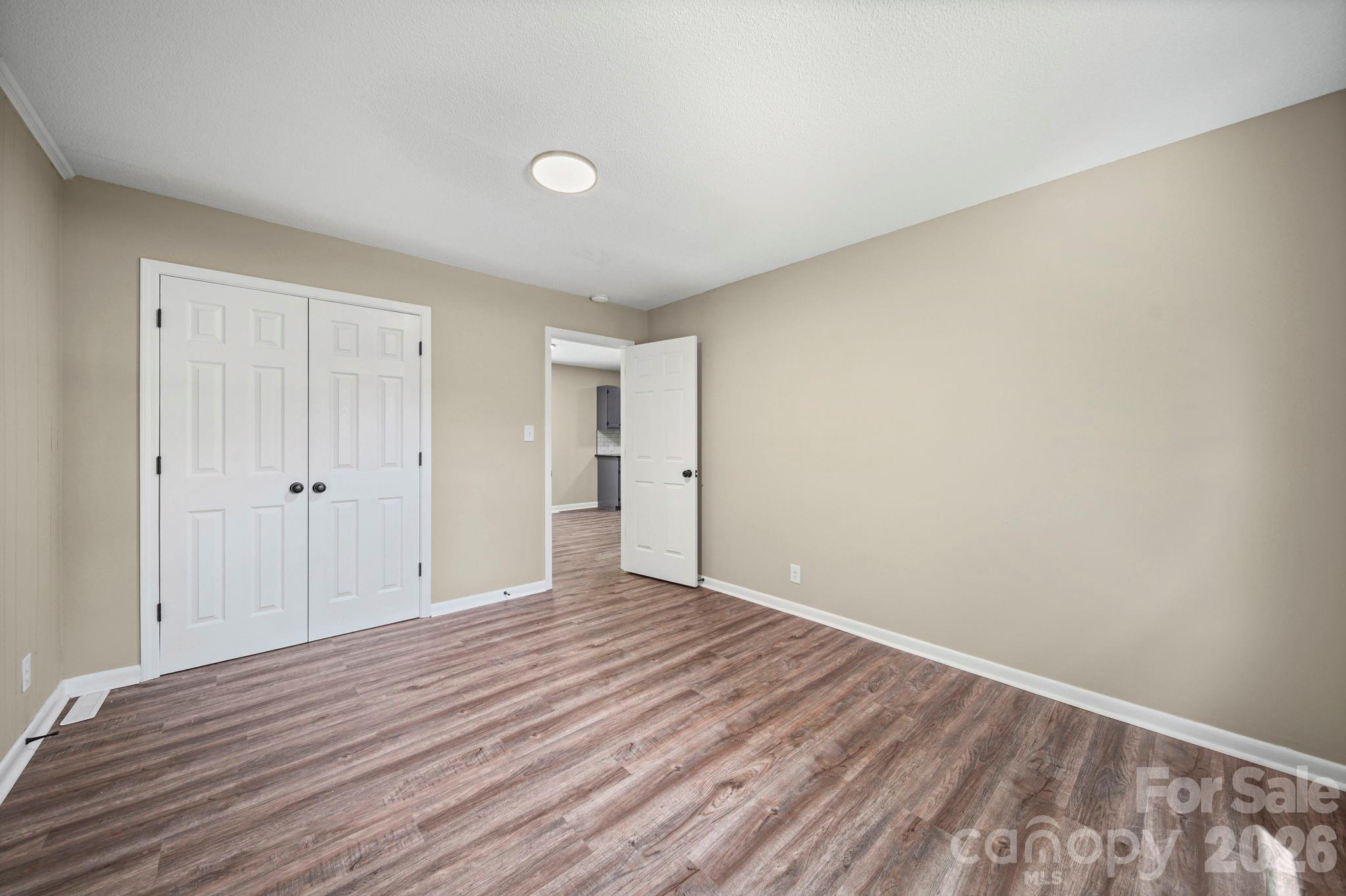 502 Geroid Street Salisbury, NC 28144 - Photo 21 of 31 a view of an empty room and wooden floor