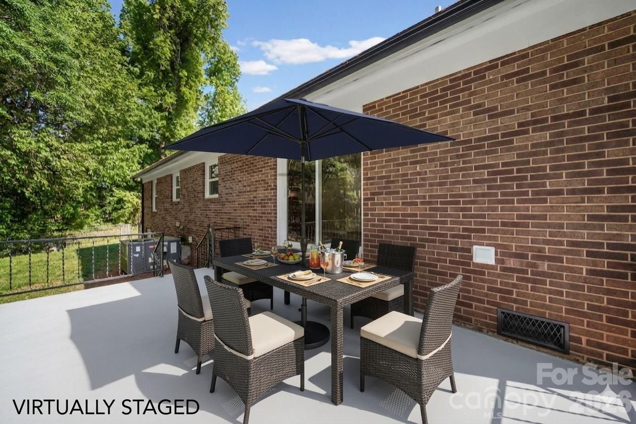 502 Geroid Street Salisbury, NC 28144 - Photo 25 of 31 a patio with tables and chairs