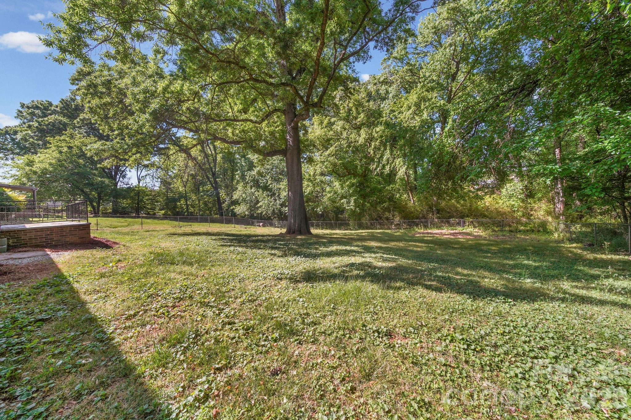 502 Geroid Street Salisbury, NC 28144 - Photo 28 of 31 a view of outdoor space with deck and yard