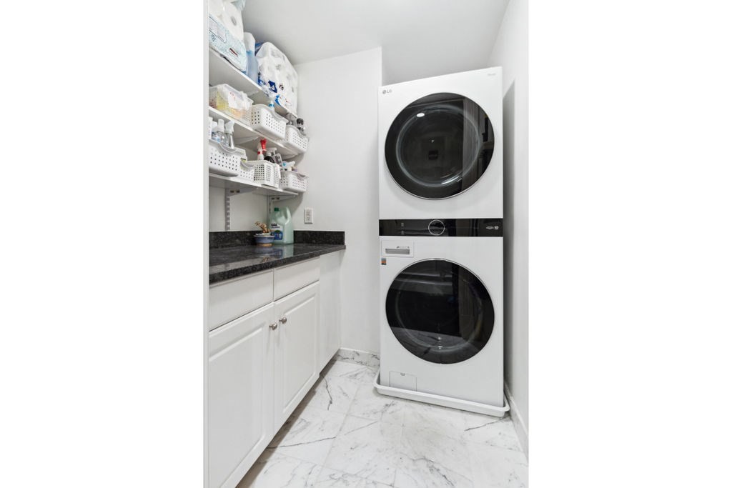 157 Newbury Street, Unit 4 Boston, MA 02116 - Photo 23 of 26 a utility room with dryer and washer