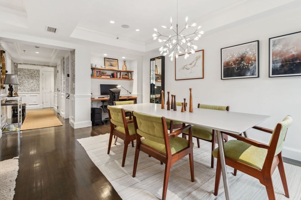 157 Newbury Street, Unit 4 Boston, MA 02116 - Photo 3 of 26 a view of a dining room with furniture