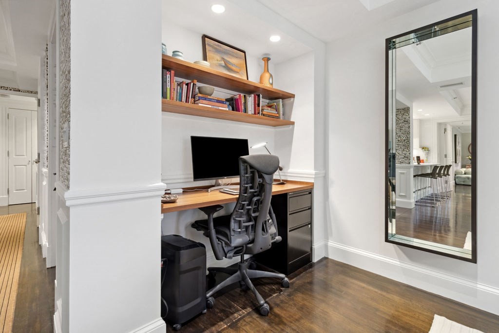 157 Newbury Street, Unit 4 Boston, MA 02116 - Photo 5 of 26 a view of a workspace with furniture