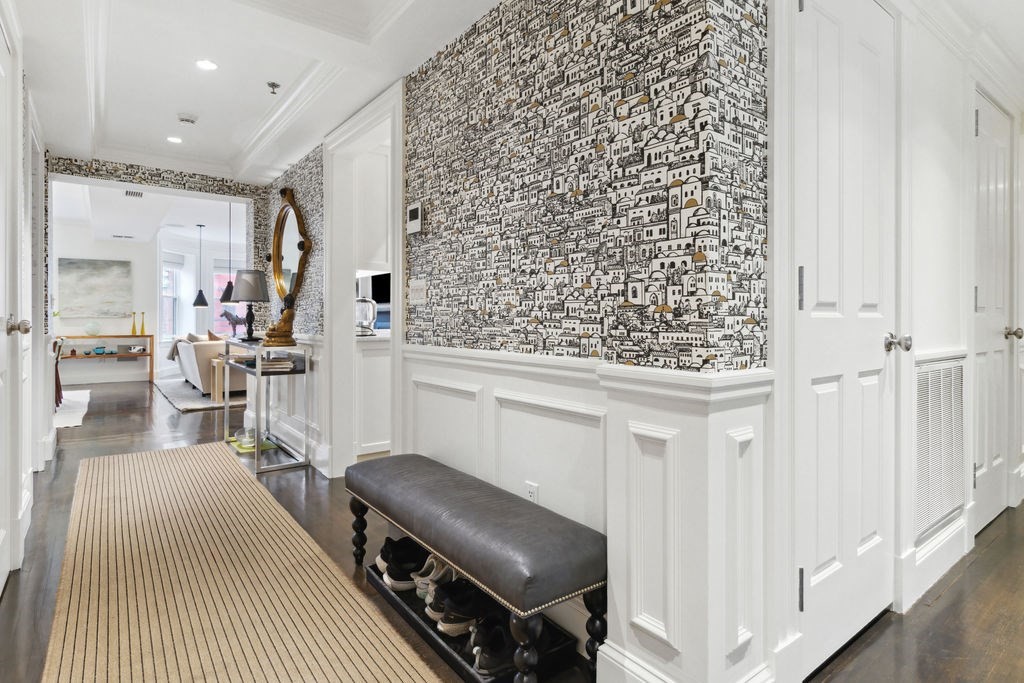 157 Newbury Street, Unit 4 Boston, MA 02116 - Photo 6 of 26 a room with a couch and a wooden floor