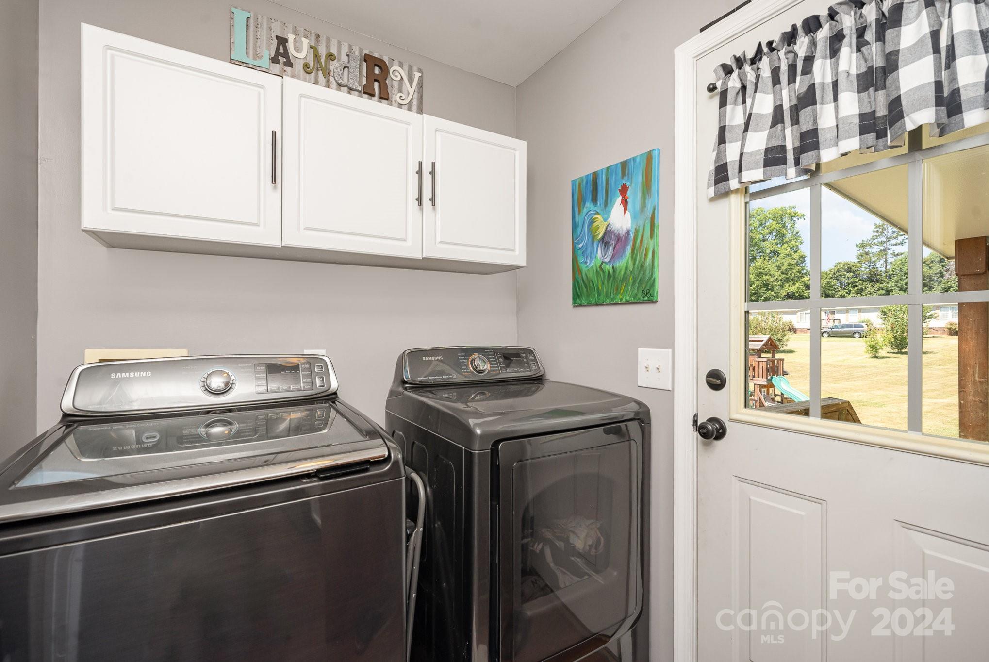 256 Hemlock Road Cleveland, NC 27013 - Photo 19 of 32 a view of washer and dryer