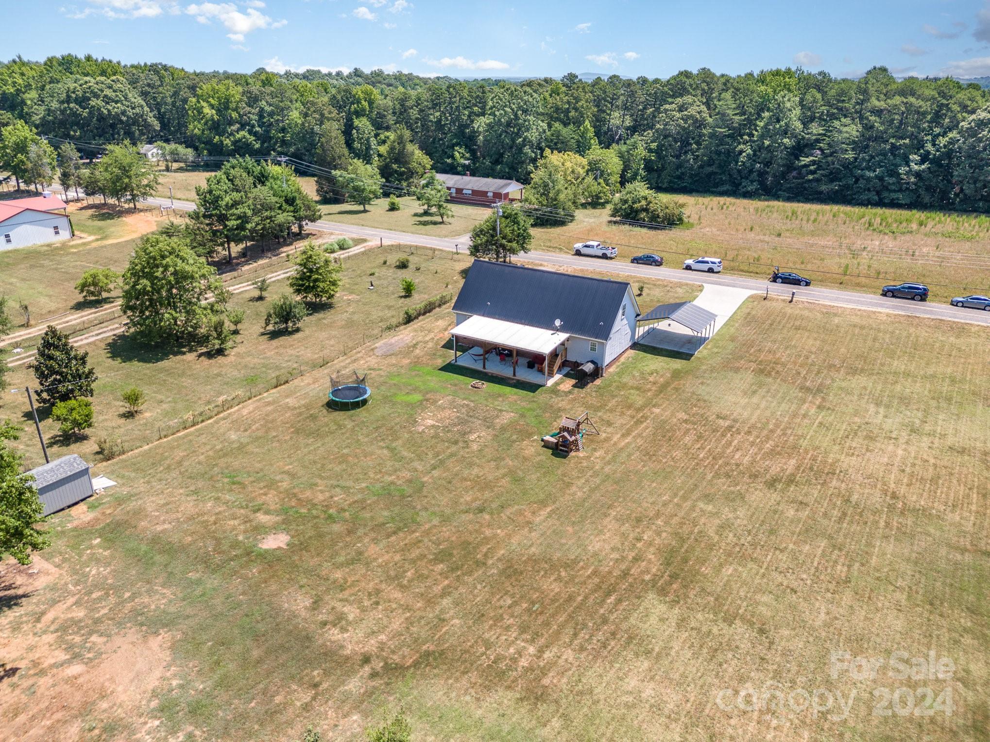 256 Hemlock Road Cleveland, NC 27013 - Photo 31 of 32 an outdoor space with patio