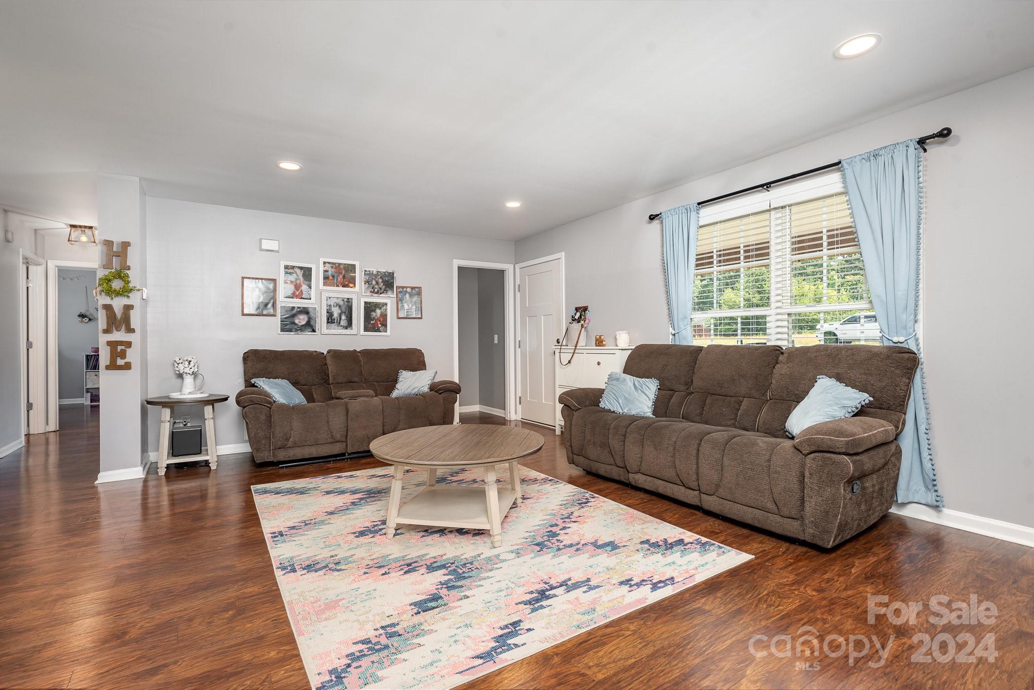 256 Hemlock Road Cleveland, NC 27013 - Photo 4 of 32 a living room with furniture and a large window