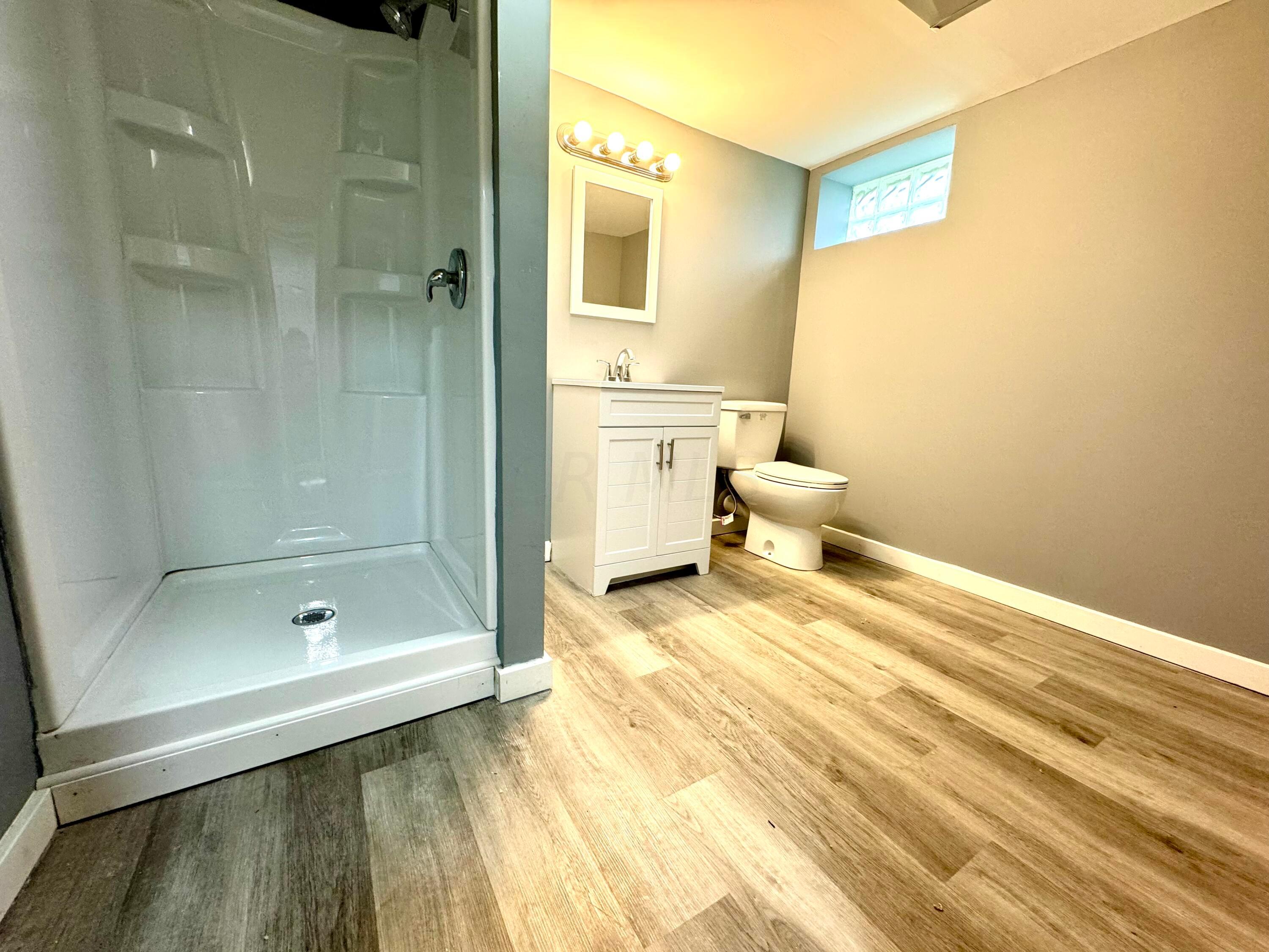 609 Raleigh Drive Columbus, OH 43228 - Photo 15 of 33 Brand new bathroom in the finished lower level.
